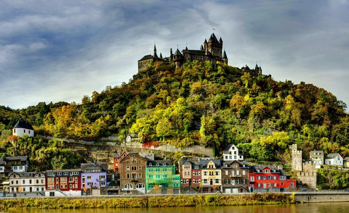 Cochem Castle overlooking a town in Germany