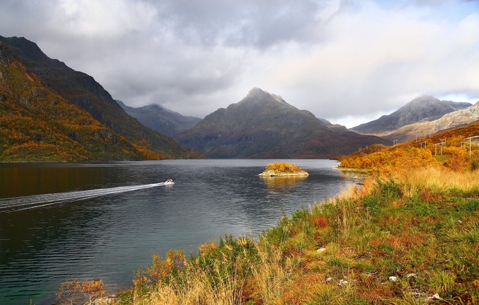 Boat on a lake in Norway during autumn