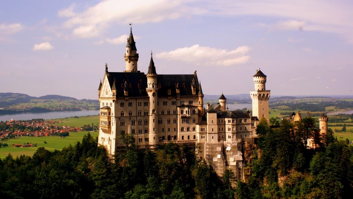 Neuschwanstein Castle in Germany with a lake and village