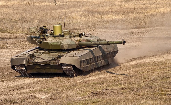 Oplot tank moving on a dirt field