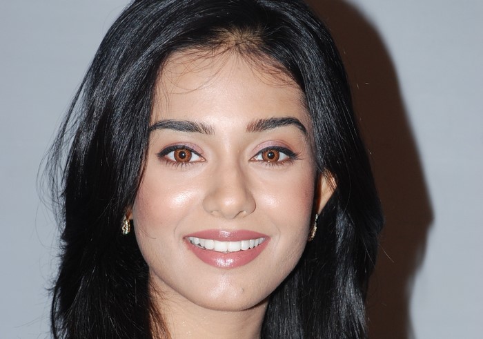 Amrita Rao smiling