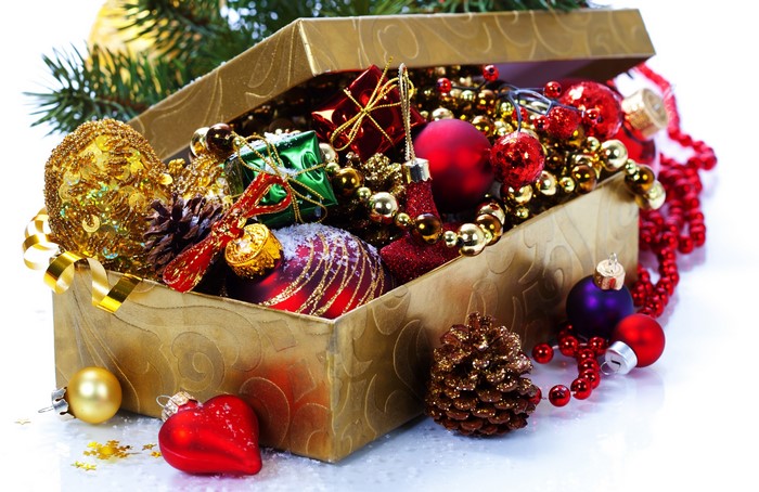 Christmas ornaments in a golden box