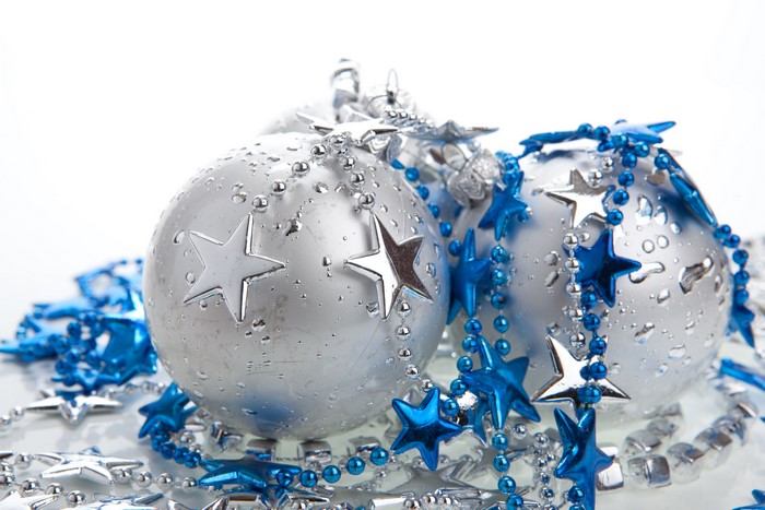 Christmas balls with blue and silver star garlands
