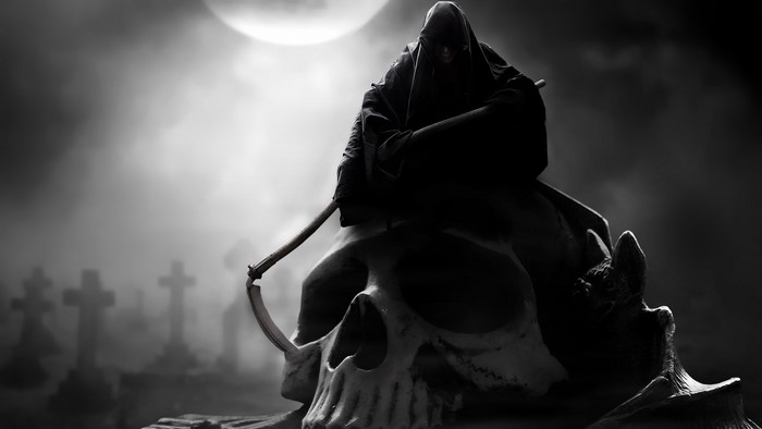 Grim Reaper sitting on a skull in a graveyard