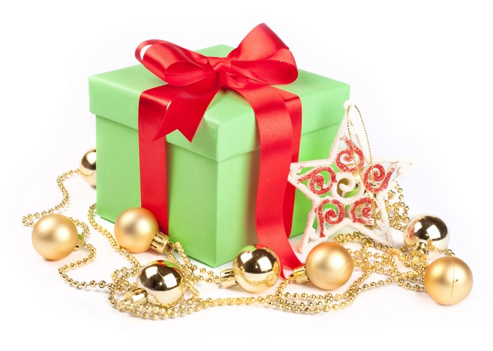 Green Gift Box with Red Ribbon and Christmas Ornaments