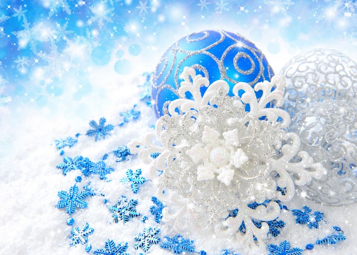 Christmas ornaments and snowflakes on snow