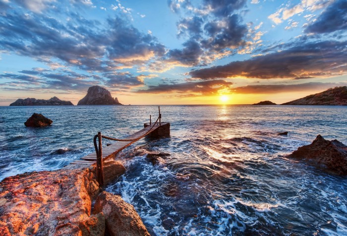 4K Sunrise over the Sea with a Wooden Pier