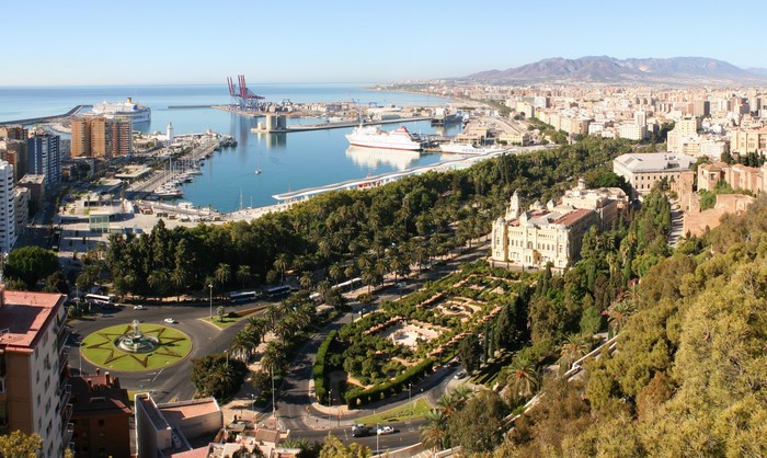 Malaga cityscape with port and mountains, Spain