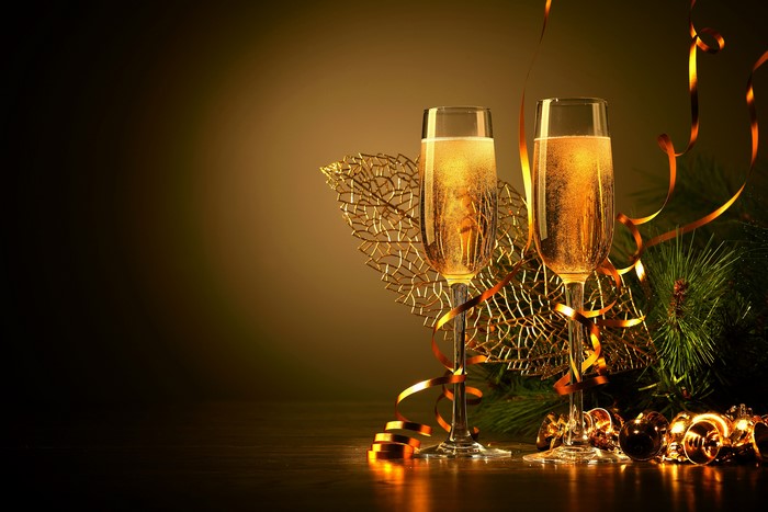 Champagne glasses with Christmas decorations