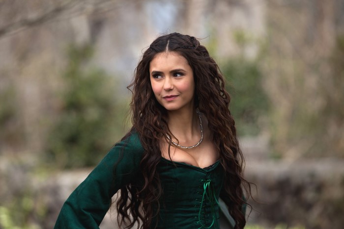 Nina Dobrev in a green dress