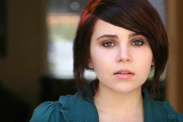 Mae Whitman looking at the camera
