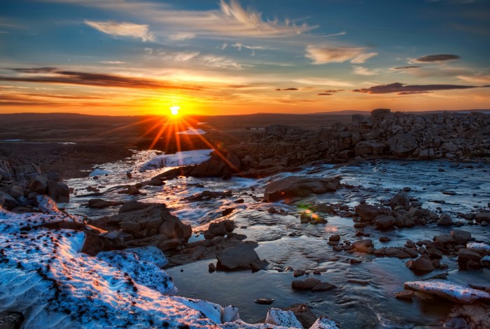 Stunning 4K Sunset Over Rocky River Landscape