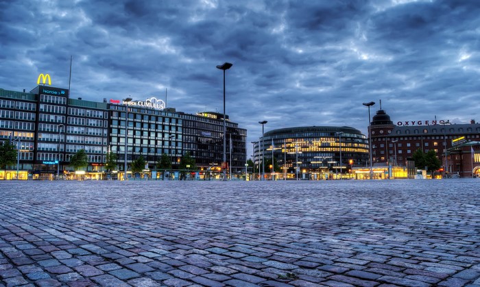 Helsinki city square with buildings and cloudy sky
