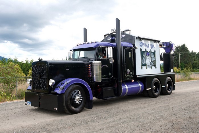 Custom Black Peterbilt Truck with Purple Accents