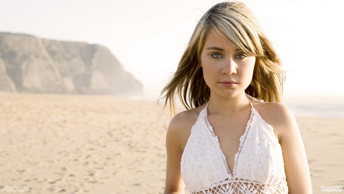 Blonde girl Anna Abreu on a beach