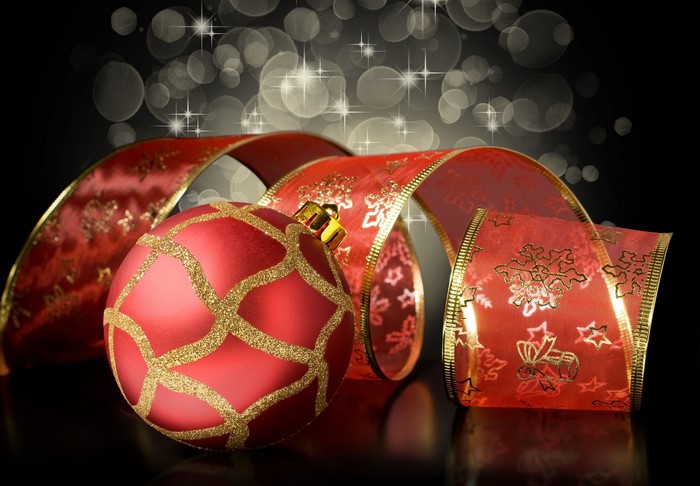 Christmas ornament and ribbon with bokeh lights
