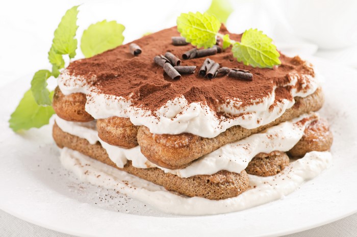 Tiramisu dessert with mint and chocolate shavings