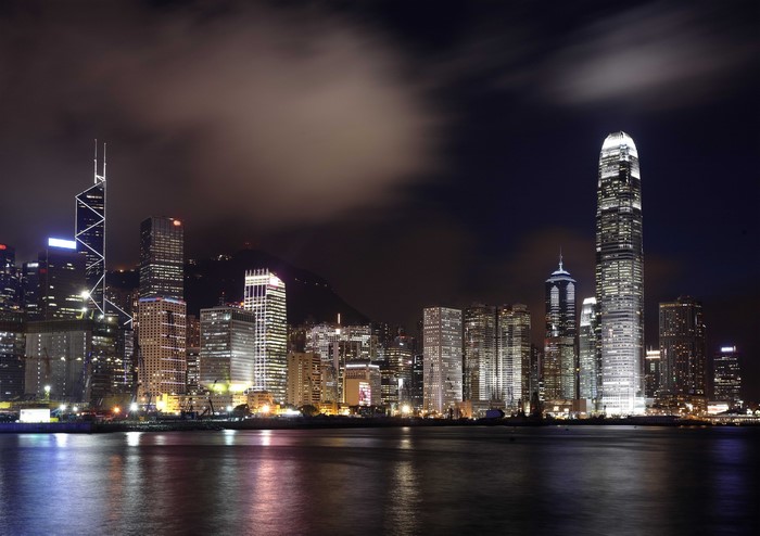 Hong Kong skyline at night with river