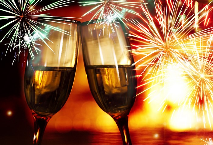 Champagne Glasses and Fireworks