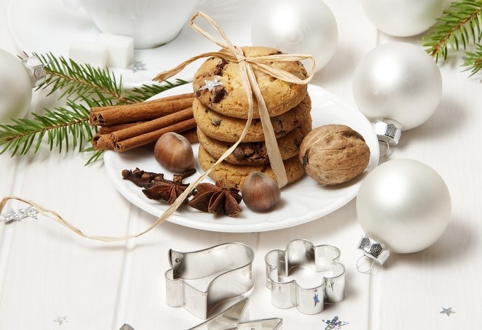 Christmas cookies with cinnamon, nuts, and ornaments
