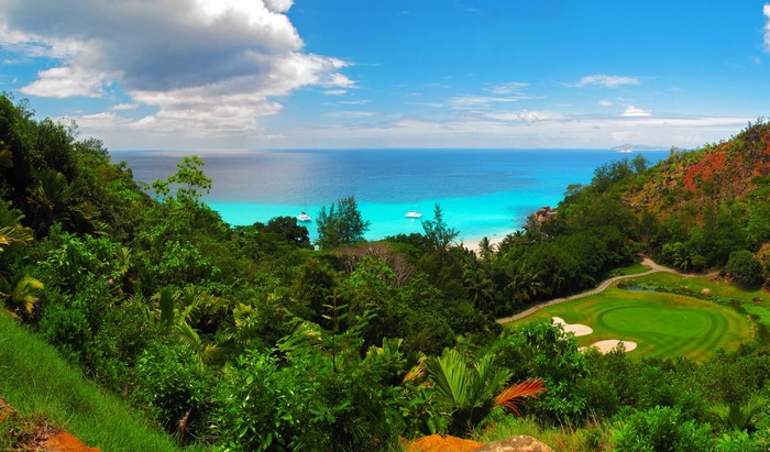 4K Tropical Coastline with Golf Course and Ocean
