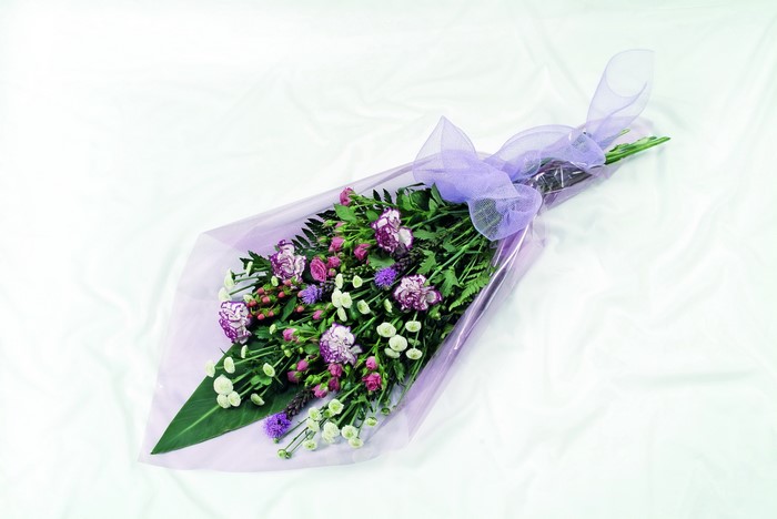 Purple and white carnation bouquet with ribbon
