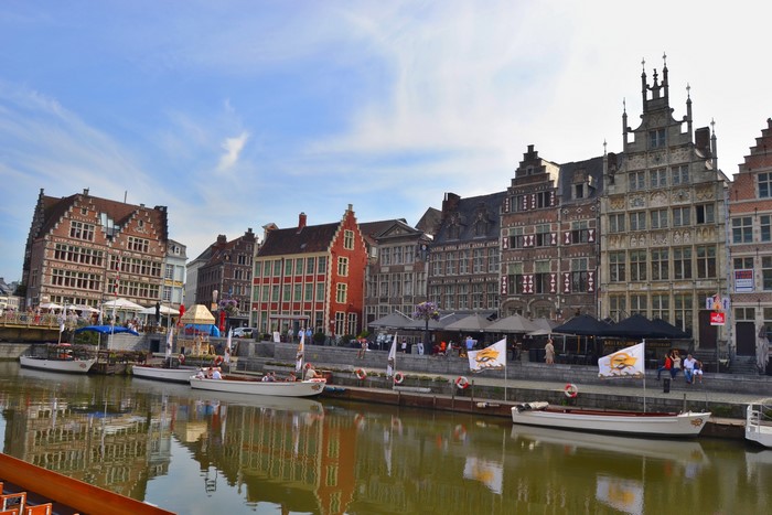 Ghent, Belgium canal with historic buildings and boats