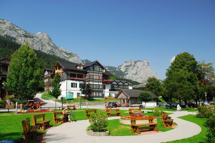 Village with mountains and park benches