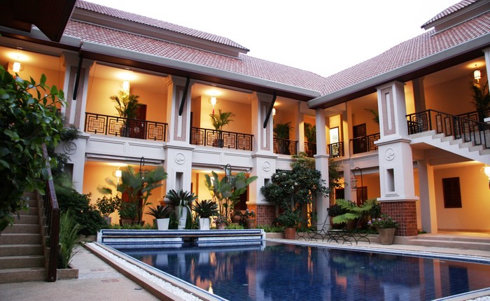 Hotel courtyard with swimming pool and balconies