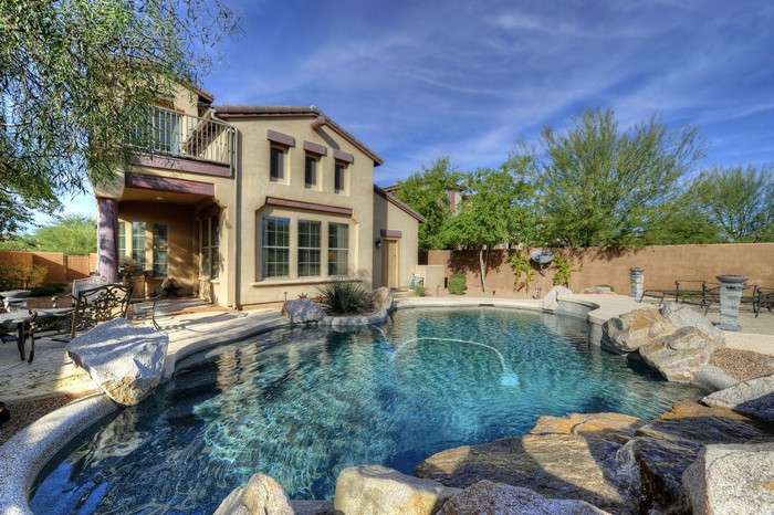 Luxury house with a swimming pool and rock features