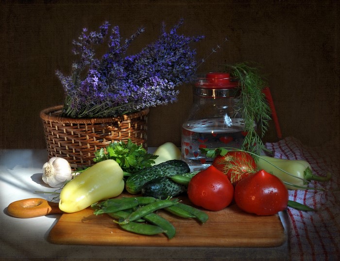 Still-life with vegetables and lavender in a basket