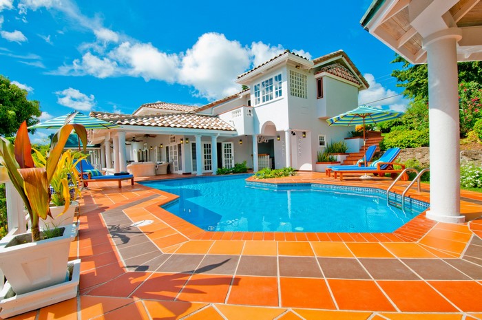 Luxury villa with swimming pool and sun loungers