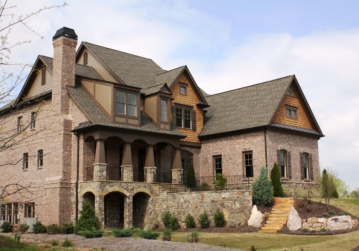 Brick Mansion with Stone Accents and Landscaping