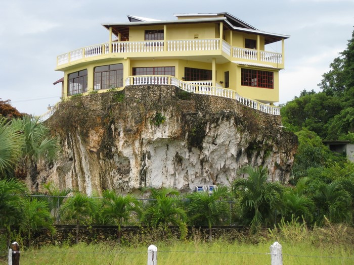 Yellow mansion on a cliff in Cabrera, Dominican Republic