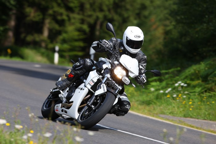 BMW K1300R motorcycle rider on a road