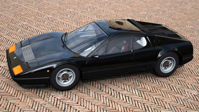 Black Ferrari 512 BB parked on a brick road