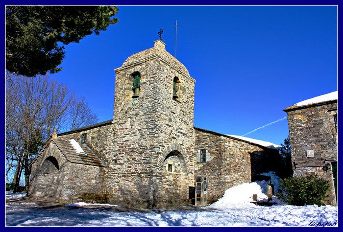 Stone Church Tower with Snow in Spain