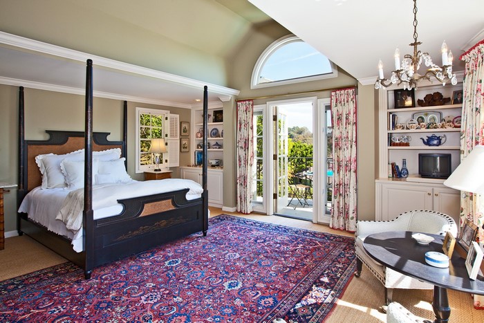 Bedroom with Four-Poster Bed and Balcony Doors