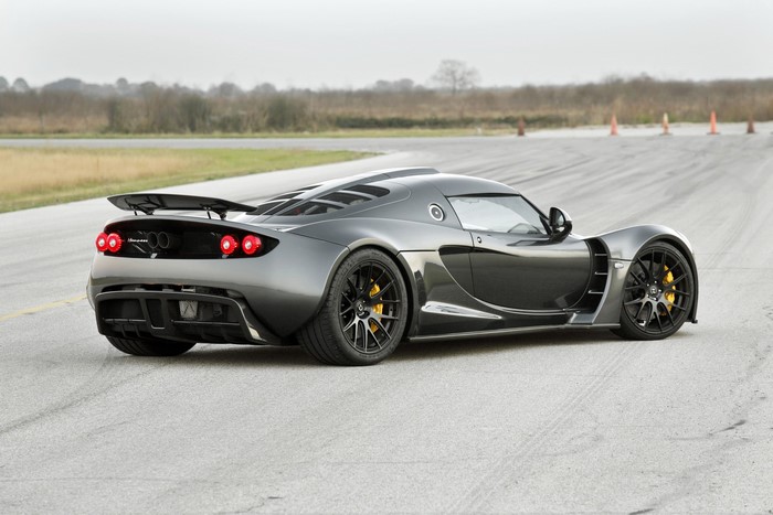 Grey Hennessey Venom GT supercar on a track