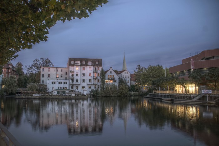 Buildings and river at dusk in Germany