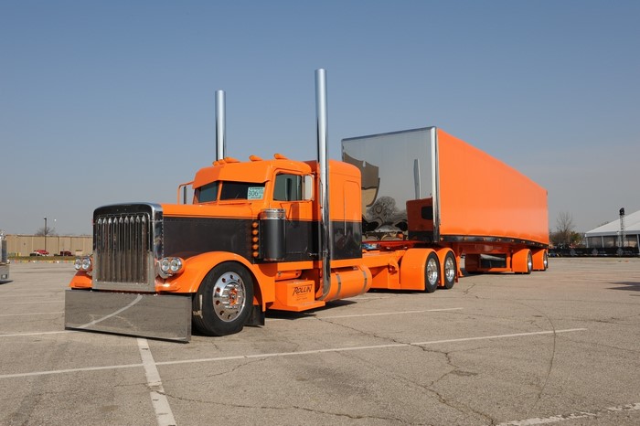 Orange Peterbilt Semi-Truck with Trailer