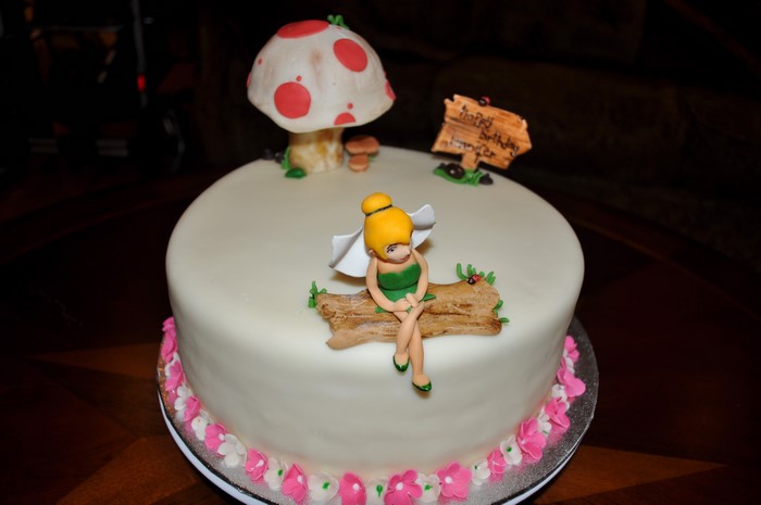 Tinkerbell cake with mushroom and birthday sign