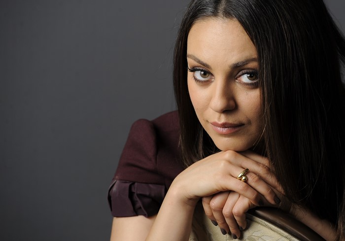 Mila Kunis Close-Up Portrait with Intense Glance
