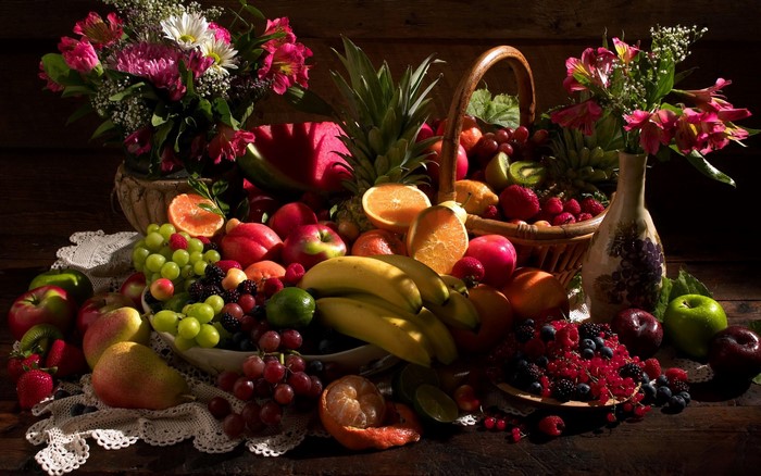 Still-life fruit arrangement with flowers