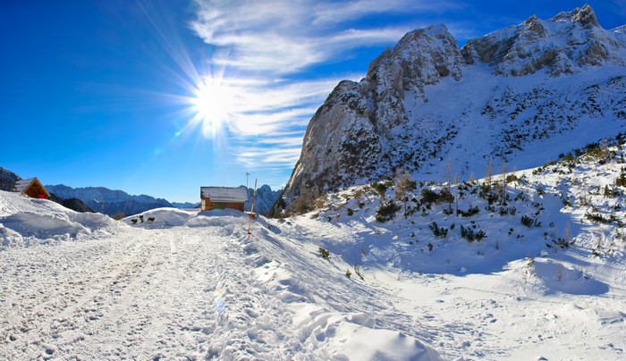 4K Winter scene in Tolmin Trenta, Slovenia with sun rays