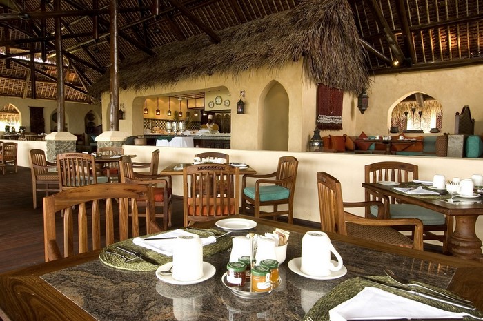Restaurant interior with tables and chairs