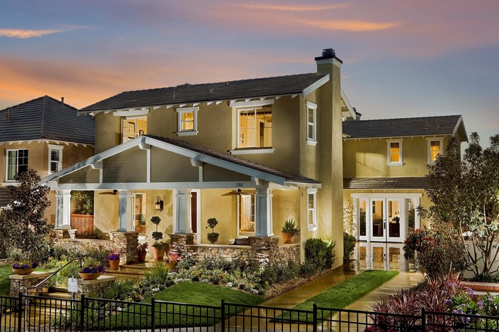 Two-story house with porch and landscaping
