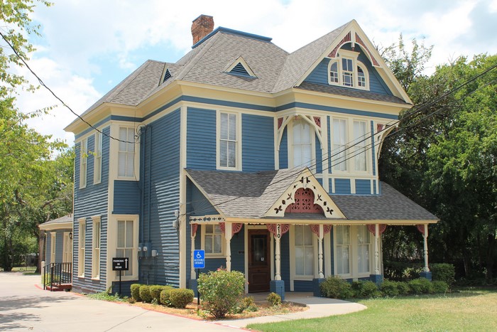 Blue Victorian House with Decorative Trim