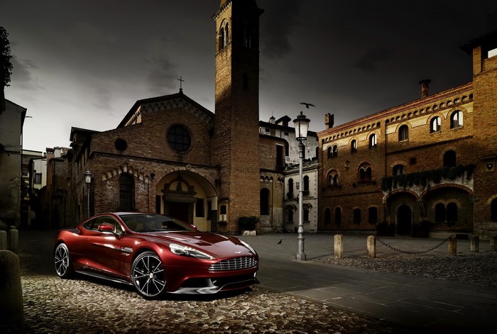 Red Aston Martin Vanquish in Italian Town Square