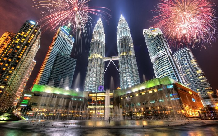 Petronas Towers with Fireworks and Fountains at Night